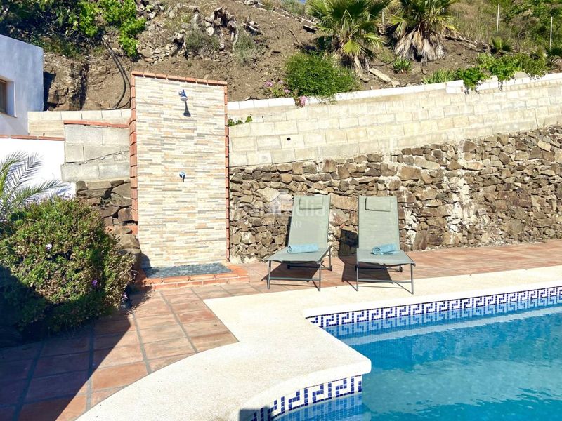 Foto a2925371-41ae-4c51-b8cc-cba54bed5550. Lloguer masia amb aparcament piscina a Árchez