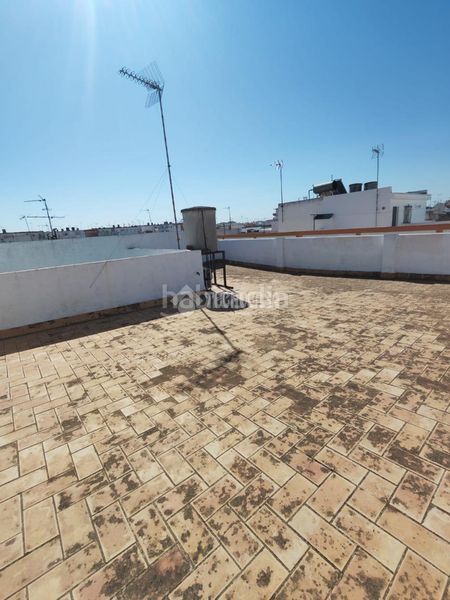 Foto 8c371bfa-43a1-4eb3-a1c8-1d511f4a4de7. Casa aparellada a Marchena