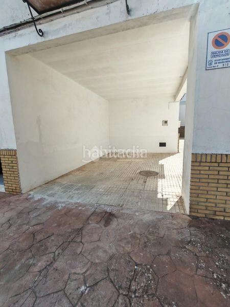 Foto a3282829-33b9-454b-af62-effdbc0c2a15. Casa aparellada a Marchena