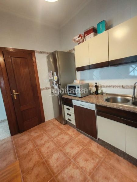 Foto ac1e3247-5fe3-4a15-badd-326c9642e2eb. Casa aparellada a Marchena