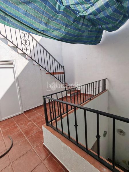 Foto b2738fbb-6ed2-4782-b507-fa7ca74b43cd. Casa aparellada a Marchena