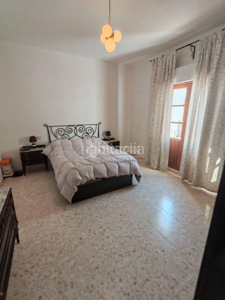 Foto f147598e-7547-4c98-8455-4fd9ff46b37a. Casa aparellada a Marchena