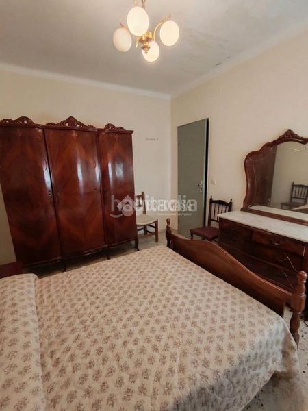 Foto 078333e7-6a6e-498d-aedb-982696f7a598. Casa aparellada a Marchena