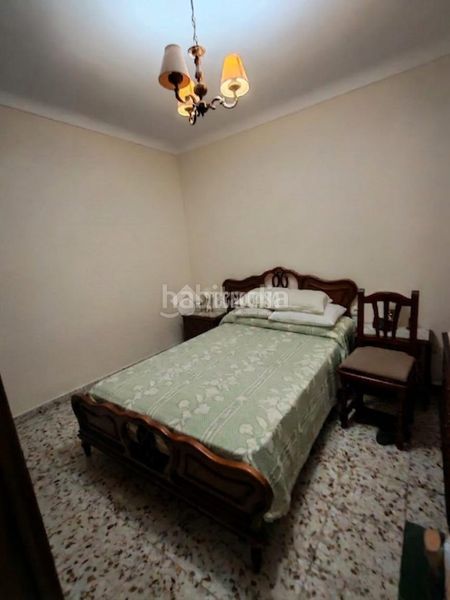 Foto 8d25dfb3-c238-4482-9fd5-3c4185b32203. Casa aparellada a Marchena