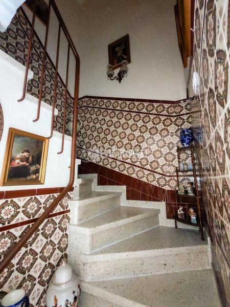 Foto be34f103-1cc4-4b81-aa35-d71b75ea9f37. Casa aparellada a Marchena