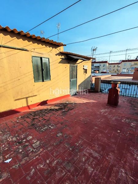 Foto c10cb195-ce7d-45a1-831f-3cbe94ea255c. Casa aparellada a Marchena