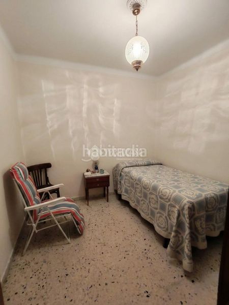 Foto dcb0bc6b-8594-49c3-8b74-e1e564b3a905. Casa aparellada a Marchena