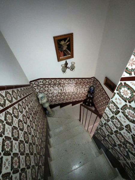 Foto f4a35aed-24cf-464d-845b-3dcf7519a80d. Casa aparellada a Marchena