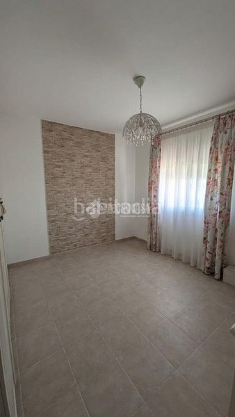 Foto cb6272d8-3fdd-44b5-8786-1832bfd350c9. Casa aparellada a Marchena