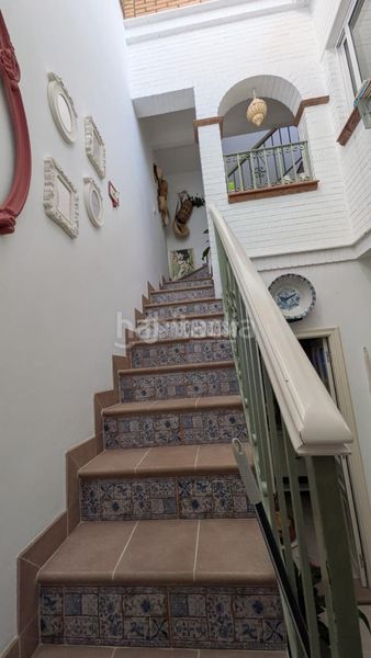 Foto db7bbd02-1f96-4938-b962-236c7359cc2b. Casa aparellada a Marchena