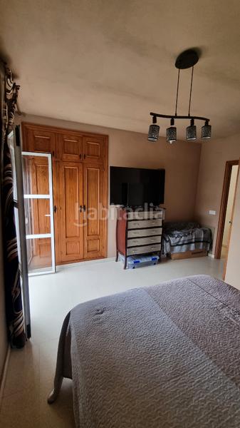 Foto 22551499-9876-4930-bc02-1c599340ae2a. Reihenhaus mit kamin parking in Taraguilla-Estación San Roque