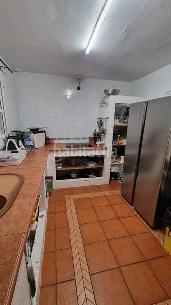 Foto 5e2f3c13-7a79-46d8-83f0-d0a84f2f0d89. Reihenhaus mit kamin parking in Taraguilla-Estación San Roque