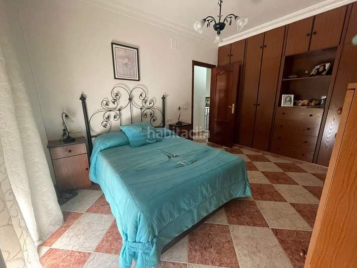Foto 8f320431-9860-42ea-b0c4-13f6036887d8. Casa adossada amb aparcament a Lepe