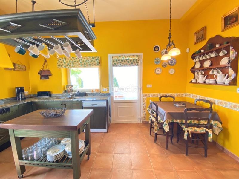 Foto 2dc10ac0-f216-4308-a9e1-744a5879b764. Chalet with fireplace heating parking pool in Urbanización Santa Rosa Torrox