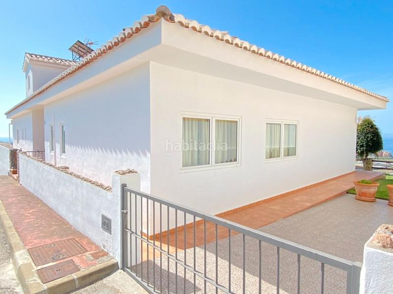 Foto 357551e8-5c79-4433-a30d-6a78f0b61c2b. Chalet with fireplace heating parking pool in Urbanización Santa Rosa Torrox