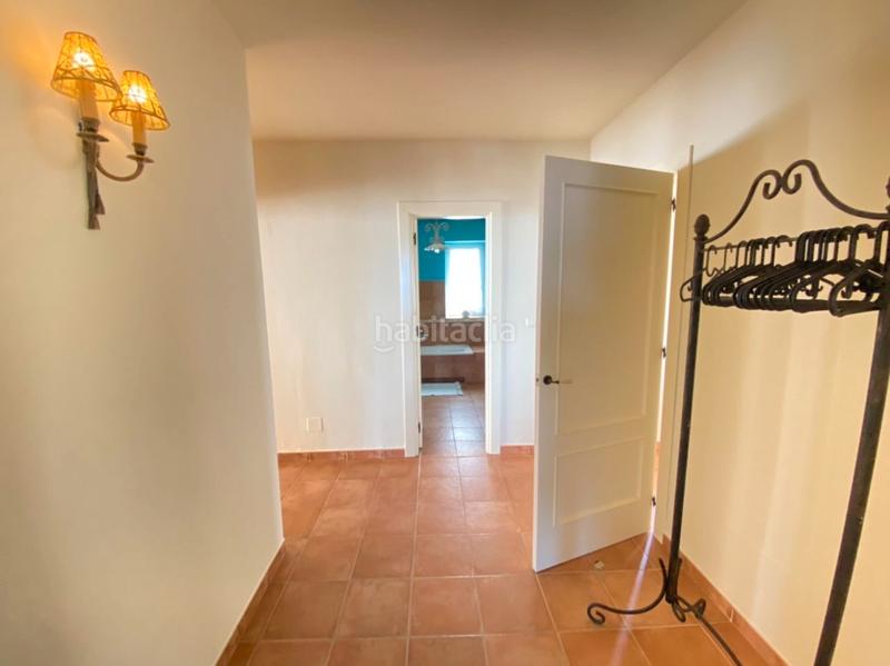 Foto 3ef39935-6957-4a1a-9e89-ebd2a66bea91. Chalet with fireplace heating parking pool in Urbanización Santa Rosa Torrox