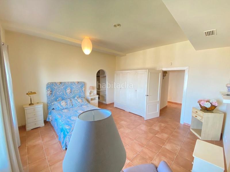 Foto 8f72f5ac-1ec5-4535-a8e1-052623f43ac3. Chalet with fireplace heating parking pool in Urbanización Santa Rosa Torrox