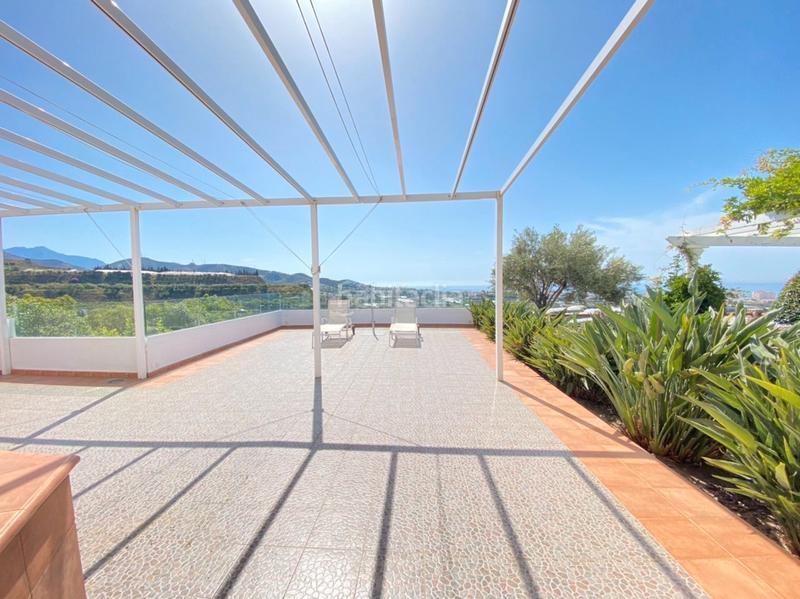 Foto 952f549d-54e6-4492-9e9d-a05ddbc4c503. Chalet with fireplace heating parking pool in Urbanización Santa Rosa Torrox