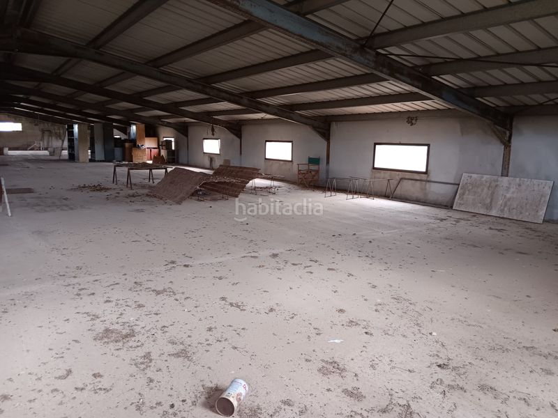 Foto fcf73cc1-00b4-49f1-a4b7-8fe682b92f2c. Bâtiment à usage industriel dans Ginestar