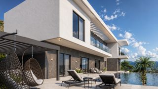 Villa de obra nueva con vistas al mar y piscina desbordante en Finestrat