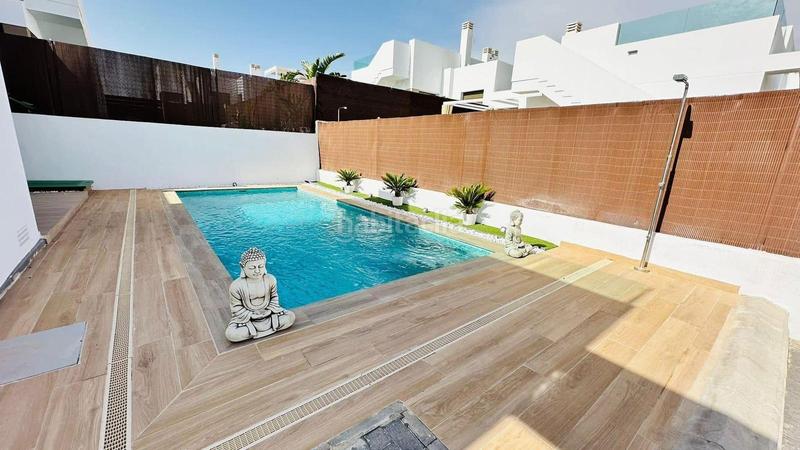 Foto 7b860d2f-e21f-413f-9f84-688e63a41d76. Casa amb aparcament a Villamartín-Las Filipinas Orihuela