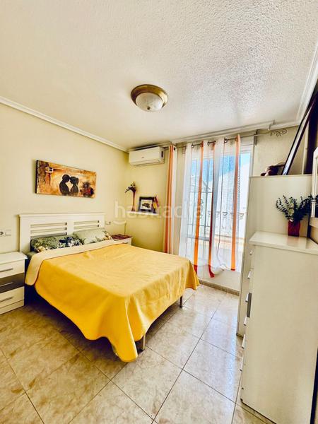 Foto 60c58636-2814-4e4c-a79c-ab4244f2a15e. Casa  en la residencia calas blancas en Zona Playa de los Locos Torrevieja