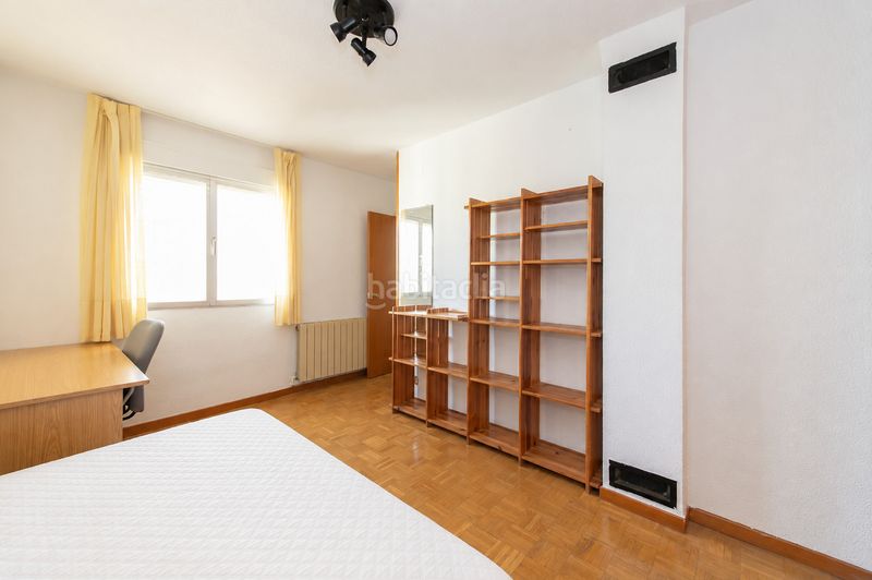 Foto 0c6c5ccf-da82-47e2-be02-45888d7a62e4. Casa a schiera con camino riscaldamento in Rosa de Luxemburgo San Sebastián de los Reyes