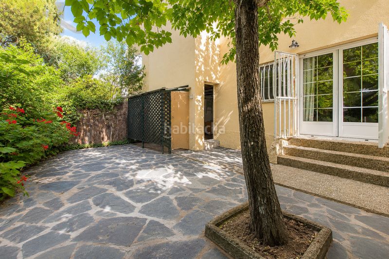 Foto 4d1e8331-f40c-4ee0-a652-6a84e71fa0e0. Casa a schiera con camino riscaldamento in Rosa de Luxemburgo San Sebastián de los Reyes