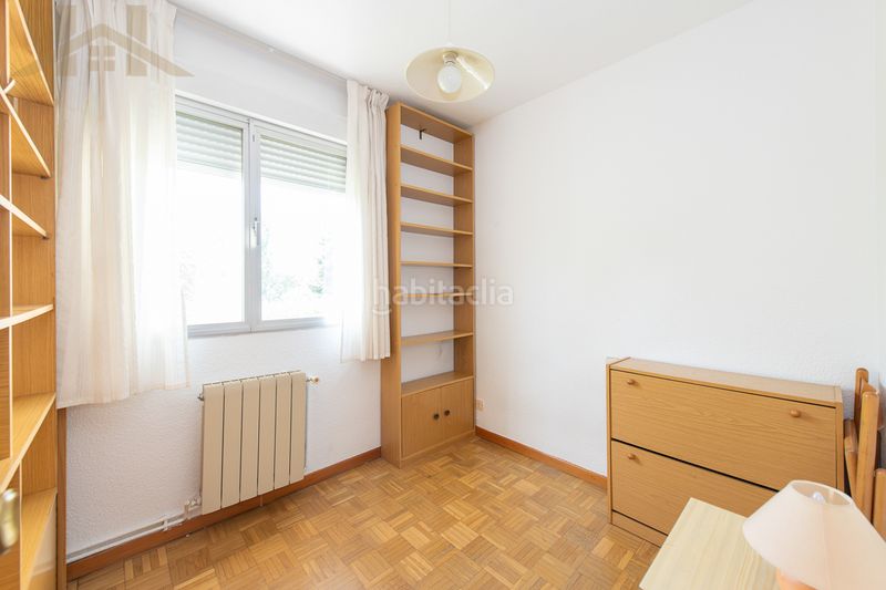Foto a74db105-f58e-42bf-a439-5a0ae2f91d48. Casa a schiera con camino riscaldamento in Rosa de Luxemburgo San Sebastián de los Reyes