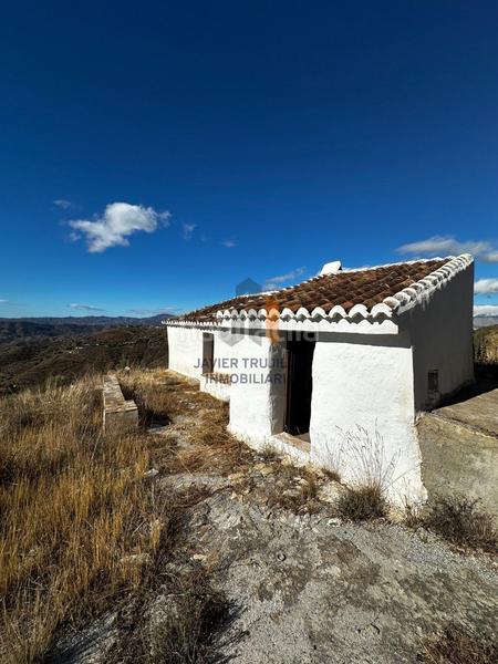 Foto 0f57b802-7cc8-4295-bc2c-680f677c87fc. Masia amb aparcament a Canillas de Aceituno