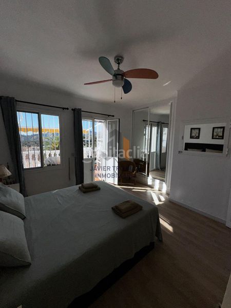 Foto 699986b8-a2a6-43e1-bf68-024e91626c0b. Casa adossada amb aparcament piscina a Avda Pescia - Ctra de Frigiliana Nerja