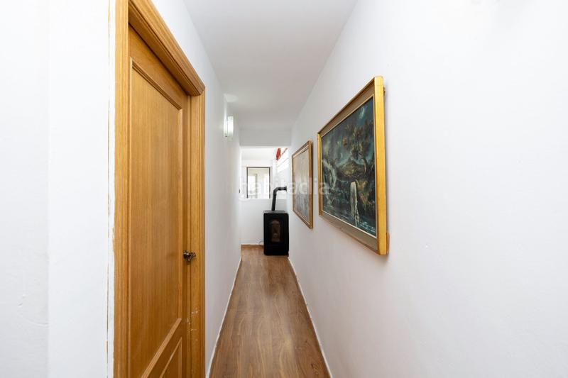 Foto b01bbdc2-eec2-42ba-9475-034a8f02ed77. Casa adossada a Bobadilla Granada