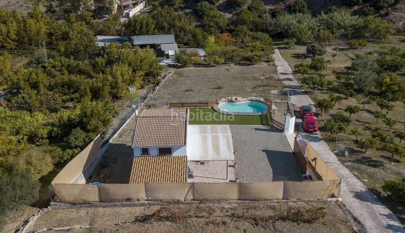 Foto afa79ade-ab0a-4cd5-a3ec-c1b1c26312eb. Bauernhof mit pool in Coín