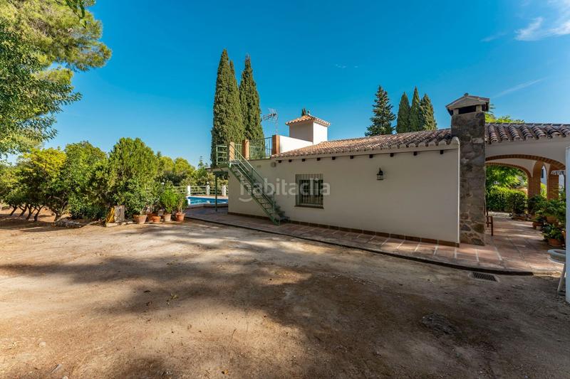 Foto d3a559a3-1d83-4fdc-8cf6-8c5f91bfb28b. Casale con parcheggio piscina in Centro Alhaurín el Grande