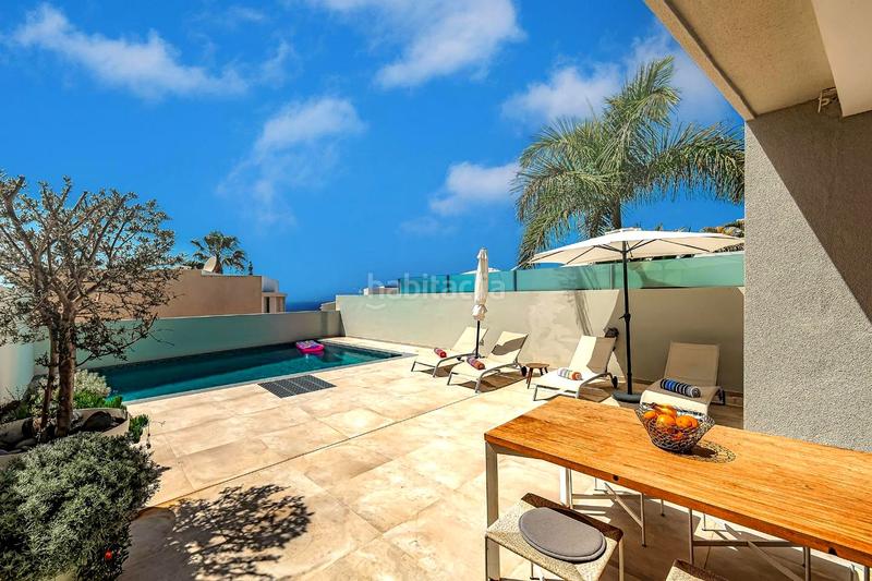 Foto 6c25079f-cfae-4ec2-bc7b-54cf5b01fd4d. Casa amb aparcament piscina a La Caleta Adeje