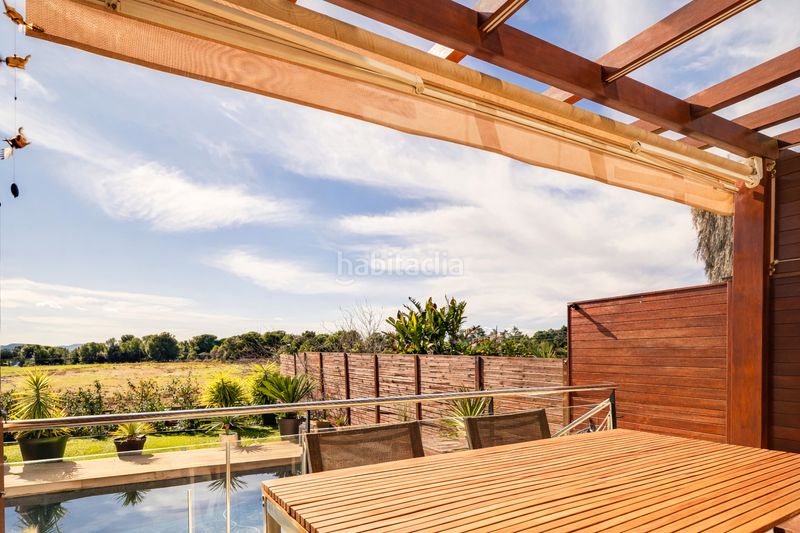 Foto 68054f0b-c249-40b1-be38-9928777058cb. Casa aparellada amb calefacció aparcament piscina a Matadepera
