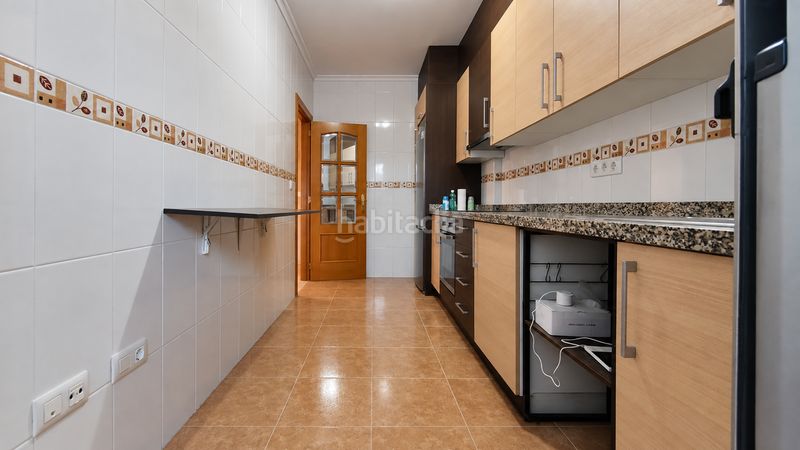 Foto 27b85c09-6fba-47c0-a0a5-29ccdb0167dd. Planta baja  con patio privado, garaje y suite con vestidor el en Elche / Elx