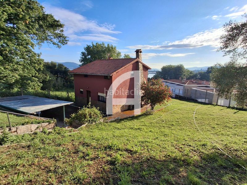 Foto fbfb1886-0f1f-4ca5-8061-f012bfb2805f. Casa amb aparcament a Alcabre Vigo