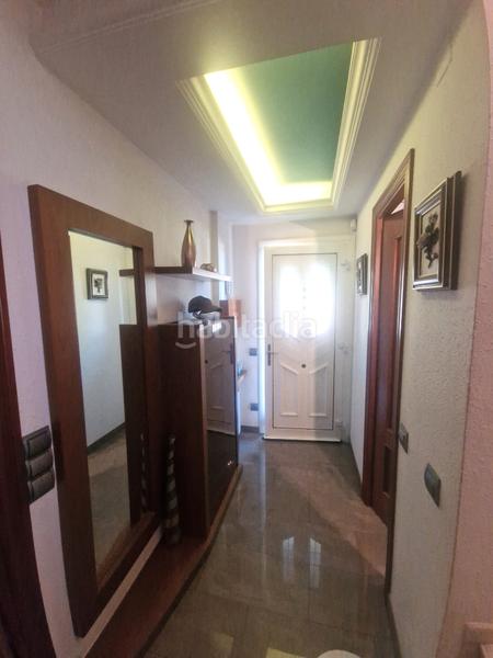 Foto 946ff151-c98a-429c-861d-5a602f95ff86. Casa aparellada amb xemeneia calefacció aparcament a Cerdanyola del Vallès