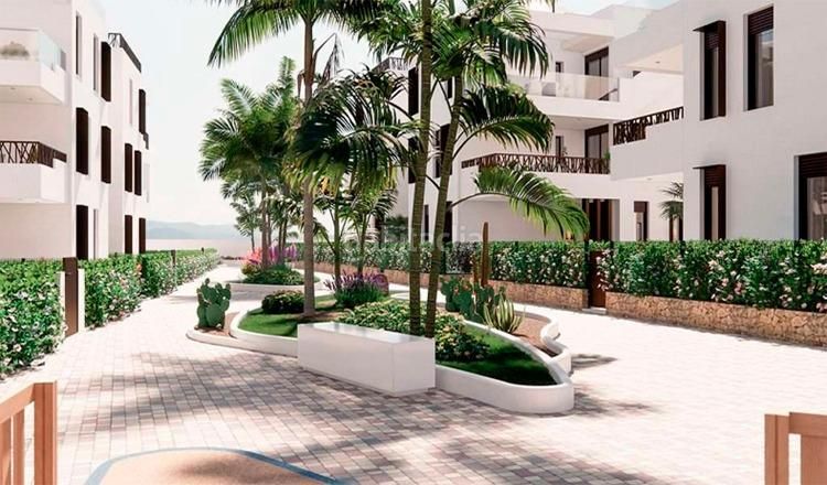Foto c75cf13b-f411-4155-b03f-cd6cd87573c2. Planta baja  de obra nueva con jardín y terrazas a 600m del mar en San Juan de los Terreros