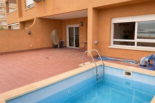 Piso  Calle vazquez montalban. Vivienda con gran terraza y piscina privada en el hornillo
