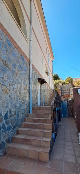 Foto 408e52e4-fdd6-4928-81e4-68b8c86a5e87. Xalet amb xemeneia calefacció aparcament piscina a Masquefa