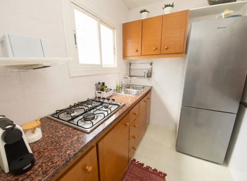 Foto 5a3c54dd-bc86-4561-8dbd-d114b7c12a12. Apartament amb xemeneia calefacció aparcament piscina a Castelldefels