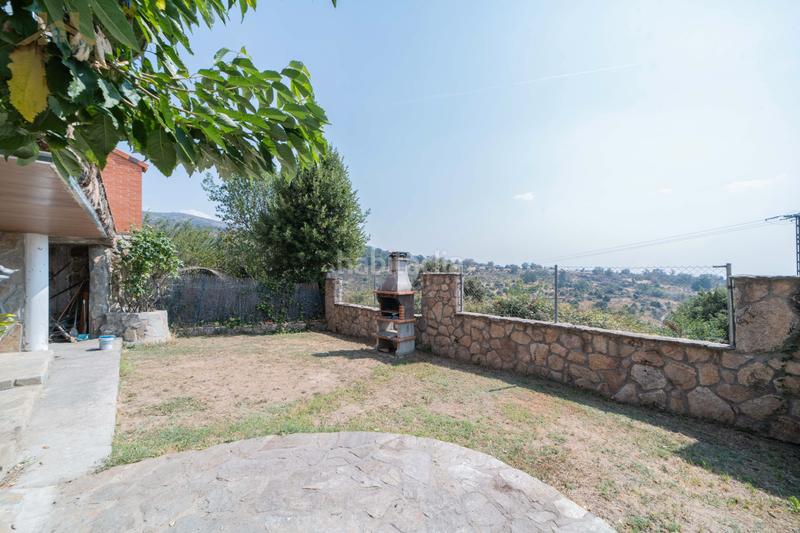 Foto a46f7a2f-4aba-44e9-9beb-f514104f58e9. Casa aparellada amb calefacció aparcament a Miraflores de la Sierra