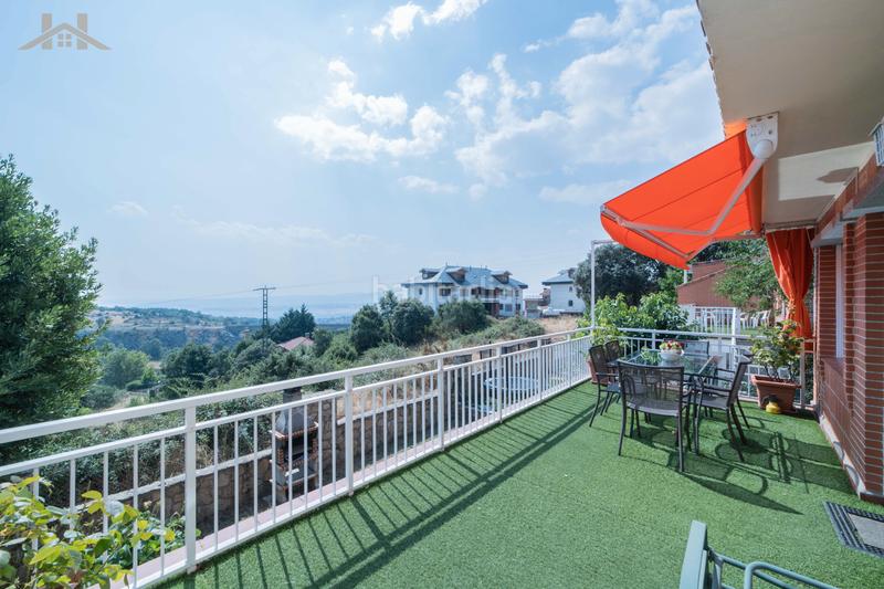 Foto b2bc866a-b949-479b-a560-4c7c4e8c6750. Casa aparellada amb calefacció aparcament a Miraflores de la Sierra