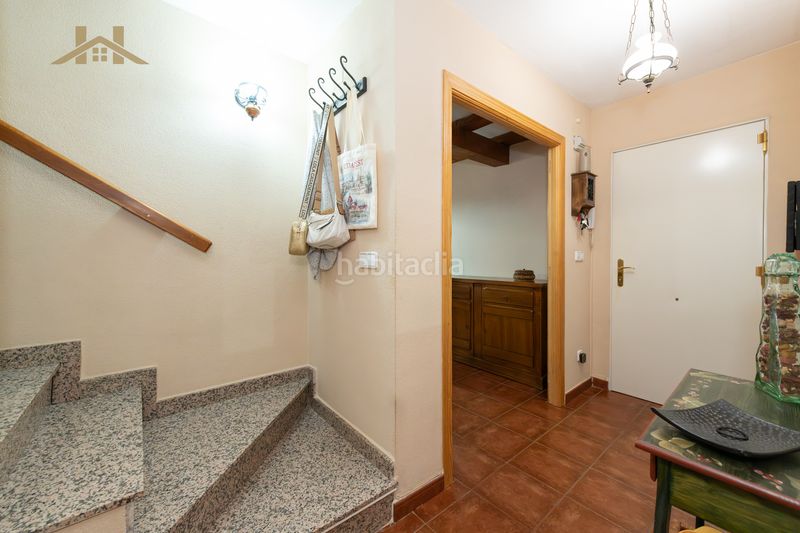 Foto 45ed3b3f-af80-42ef-9316-4459c2e55337. Casa aparellada a Miraflores de la Sierra