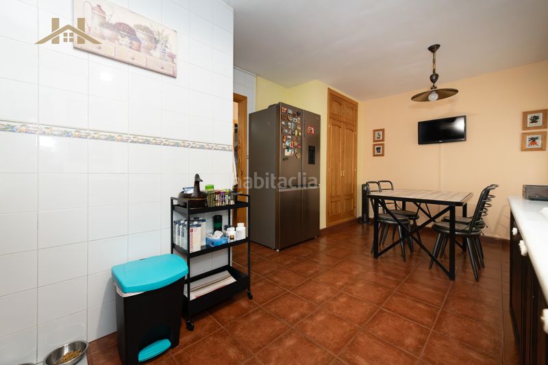 Foto a10b3bd3-92f1-4435-9384-7cbc071df7a6. Casa aparellada a Miraflores de la Sierra