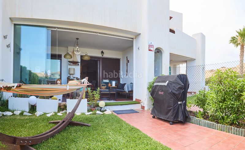 Foto 43bfaadb-ac3d-4678-a64d-9c3bf05a17ec. Casa adossada amb aparcament piscina a Las Salinas Vera