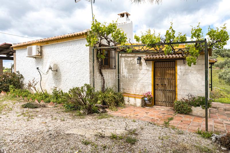 Foto 3443566c-43da-460c-93a6-e8c03bf9a9fc. Pis amb xemeneia calefacció aparcament piscina a Periana