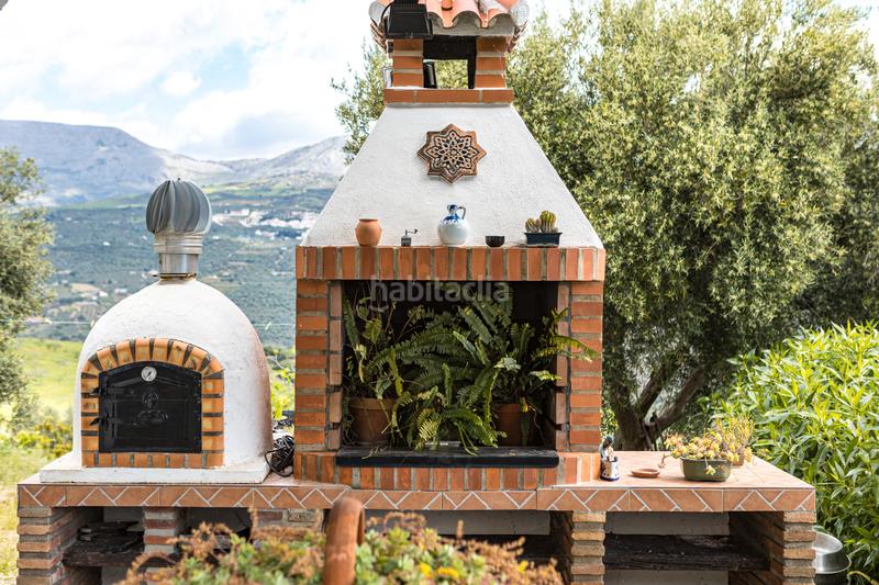 Foto 5381fe42-2ed7-4a9d-9808-3da7a8d2ef5e. Pis amb xemeneia calefacció aparcament piscina a Periana